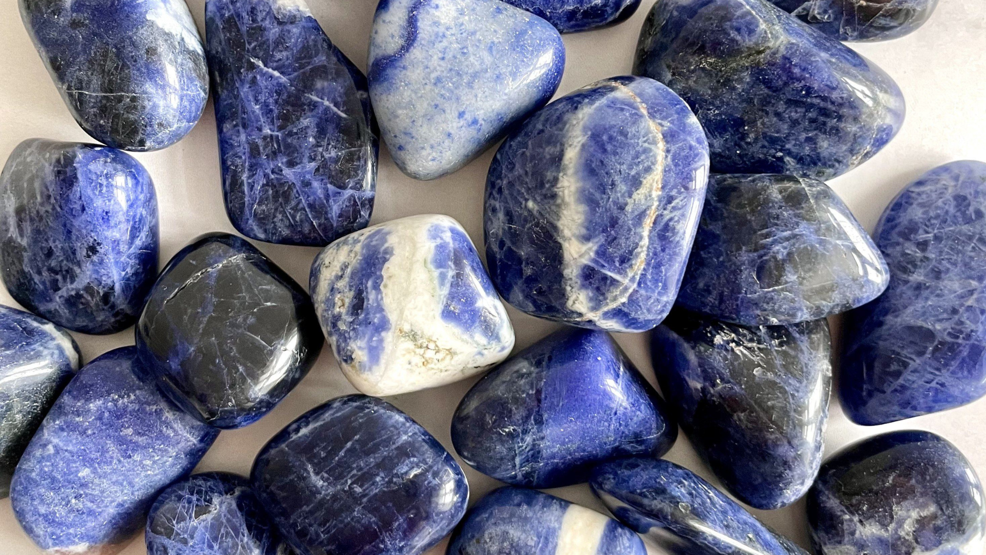 Sodalite Smooth Stones, Shop Healing Sodalite Crystals & Gemstones