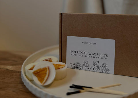 Handcrafted botanical wax melts with natural dried flowers, made from coconut wax for a clean and long-lasting home fragrance.